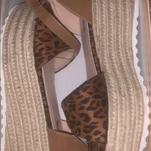 Brand New never worn. Size 9 Leopard prong wedges